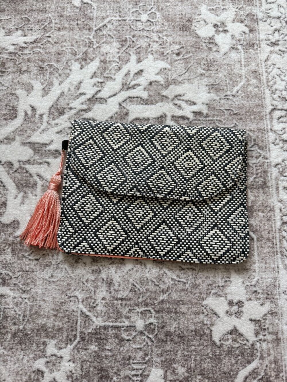 Woven envelope clutch bag